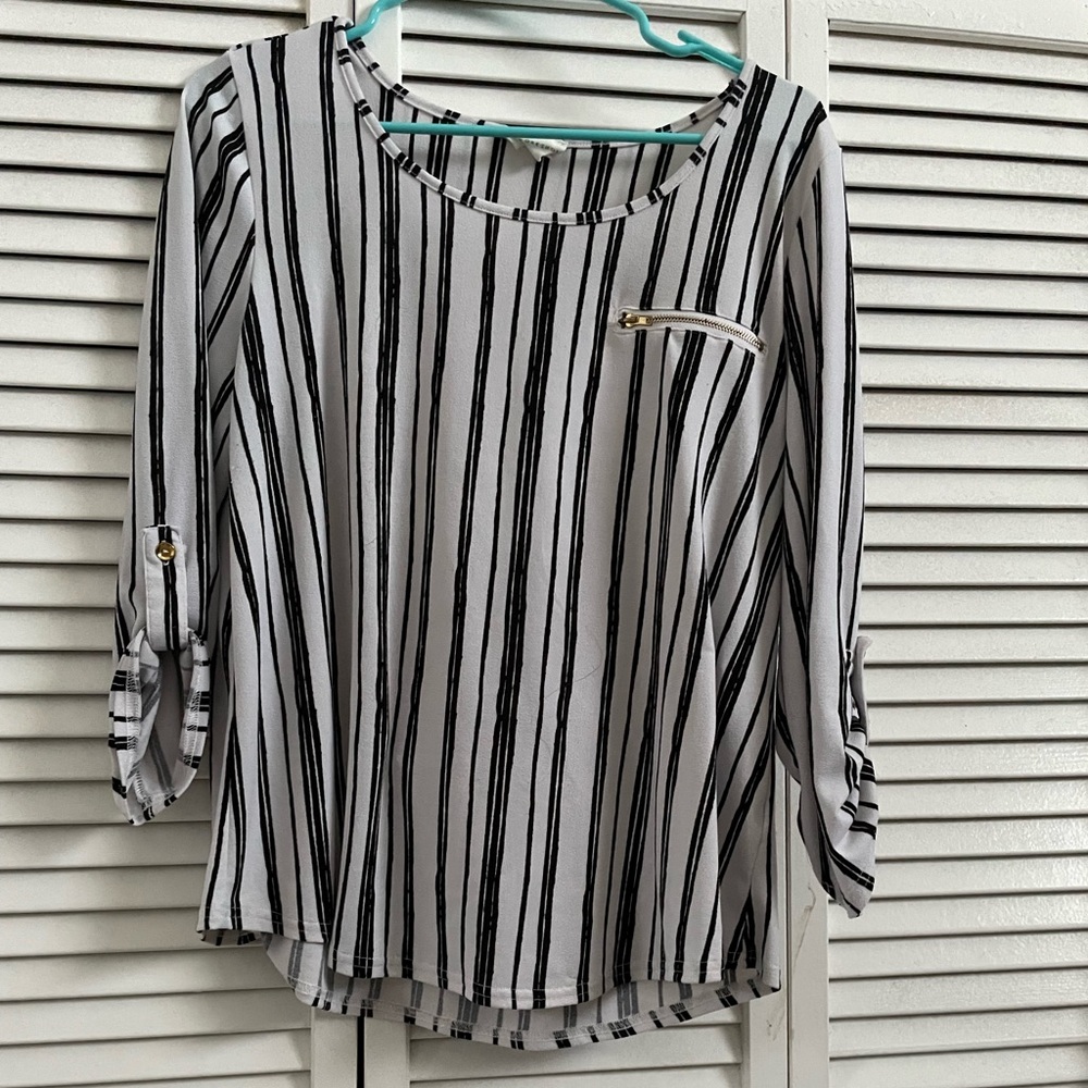 Size large striped women’s long sleeve shirt.